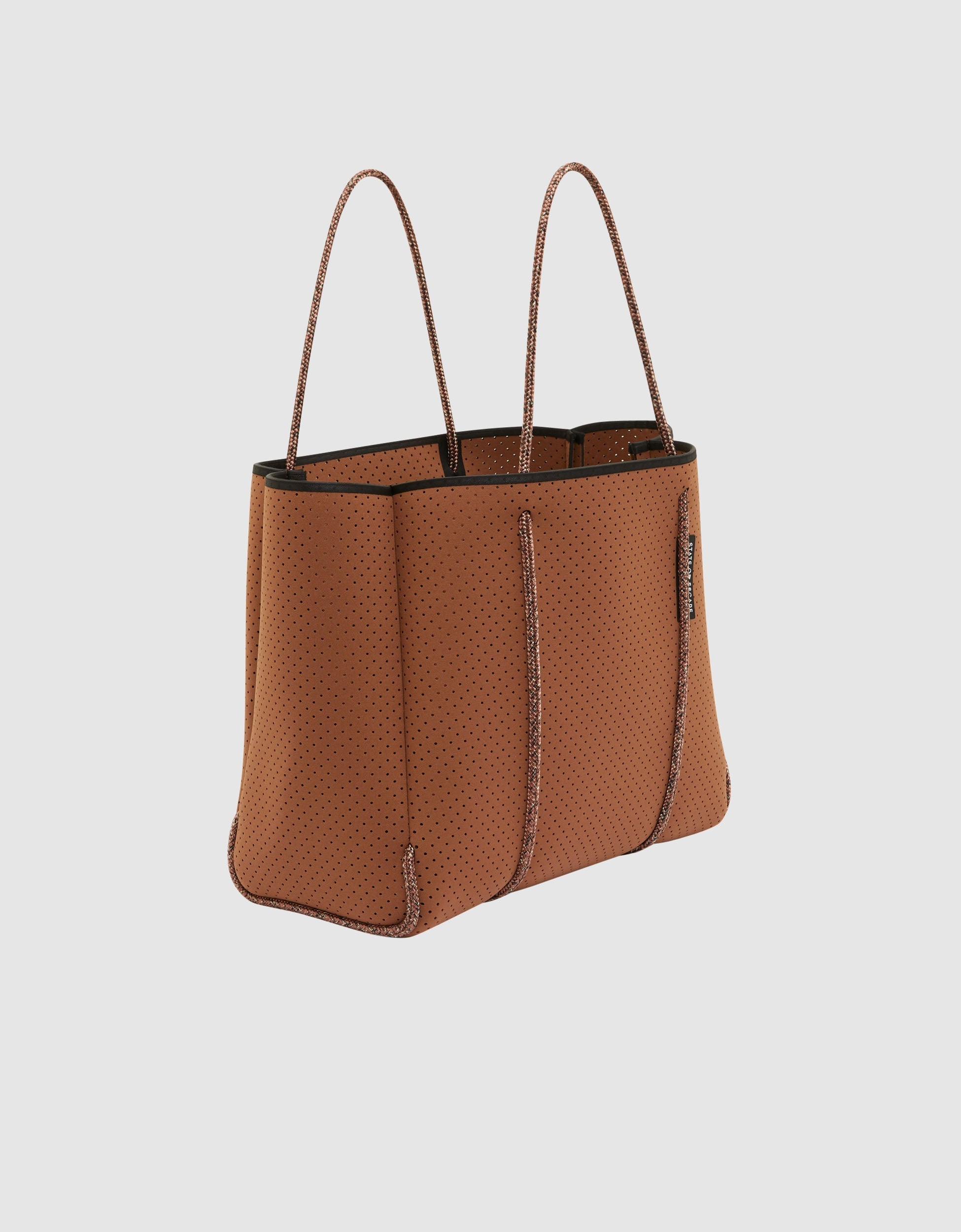Flying Solo tote in saddle – State of Escape