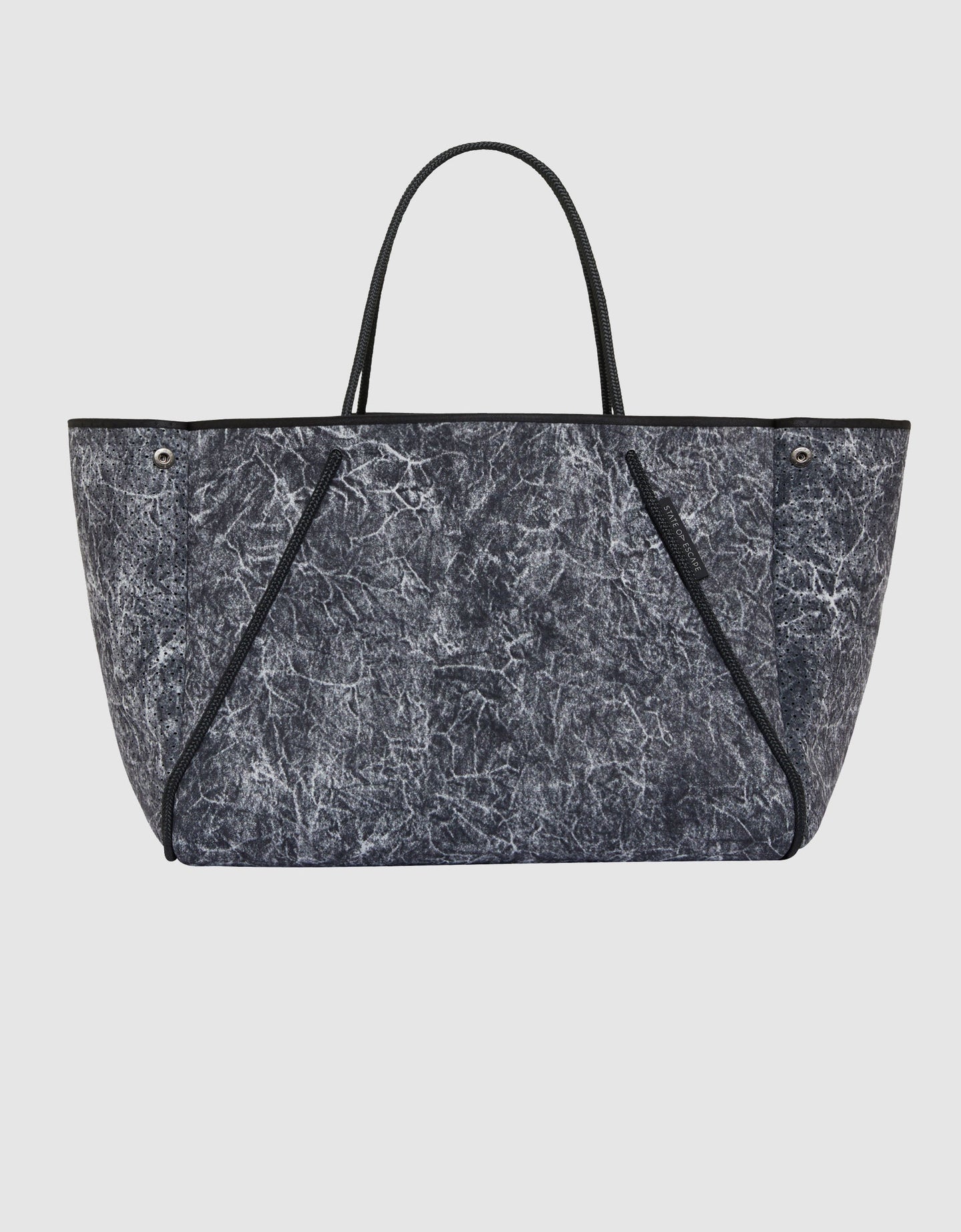 Guise tote in acid washed black print – State of Escape
